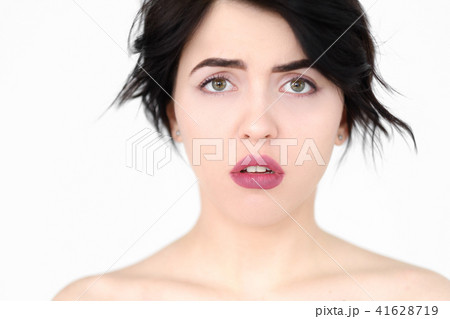 emotion face worried alarmed agitated woman 41628719