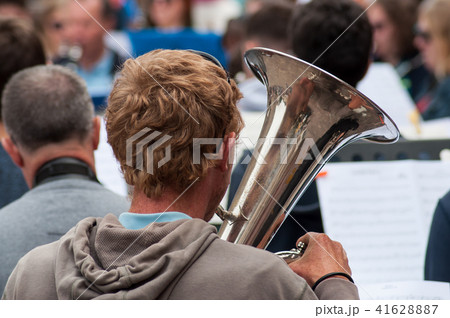 closeup of tuba player in the street closeup of tuba player in the street 41628887