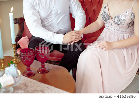 Close-up happy young couple have a date in luxury apartment Close-up happy young couple have a date in luxury apartment 41629380