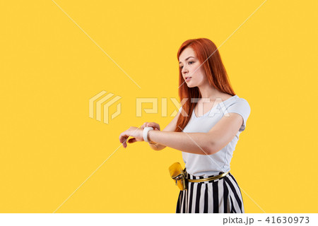 Good looking attractive woman using modern technology Good looking attractive woman using modern technology 41630973