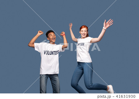 Delighted nice people jumping 41631930