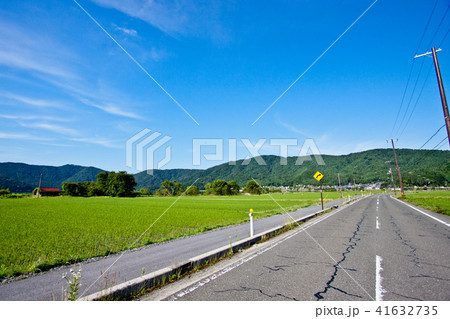 田んぼと道路 田舎2の写真素材