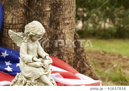 girl angel statue with the flag of america girl angel statue with the flag of america 41637838