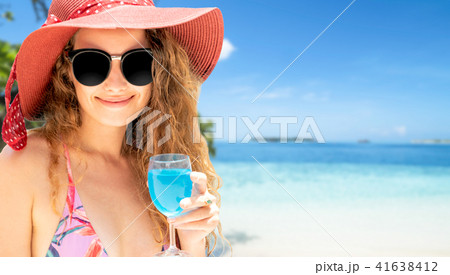 Happy young woman at beach in summer vacation. 41638412
