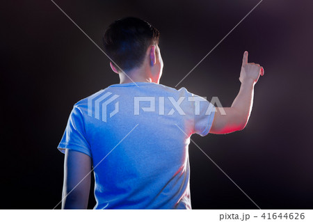 Smart Asian man turning on the screen 41644626