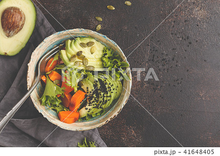 Vegan salad, rainbow bowl with baked sweet potato Vegan salad, rainbow bowl with baked sweet potato 41648405