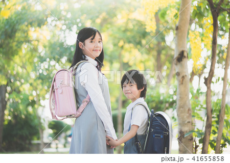 Cute Asian children going to the school Cute Asian children going to the school 41655858