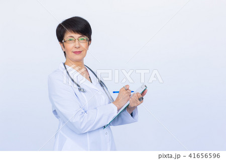 Medical physician doctor woman over white background 41656596