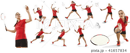 Young woman playing badminton over white background 41657834