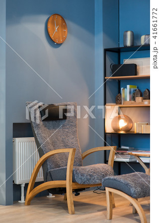 Apartment with modern armchairs and blue wall 41661772