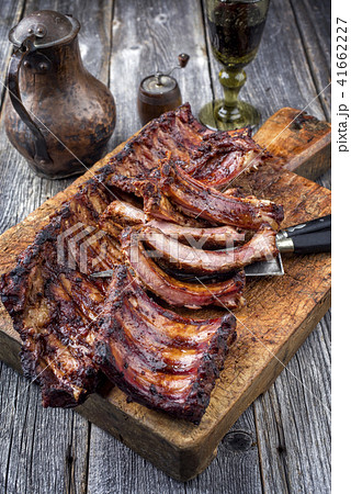 Barbecue Pork Spare Ribs as top view on an old cut Barbecue Pork Spare Ribs as top view on an old cut 41662227
