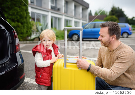 man and his little son going to vacations man and his little son going to vacations 41662250