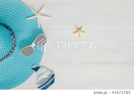 Summer Fashion woman blue big hat. Tropical sea. Summer Fashion woman blue big hat. Tropical sea. 41671705