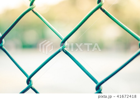 blurred players on the outdoor basketball court. 41672418