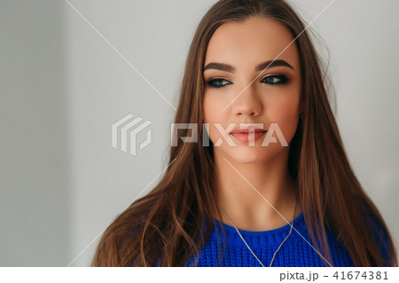 Portrait of the young beautiful smiling woman inside Portrait of the young beautiful smiling woman inside 41674381