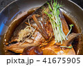 salmon fish head soup with soy sauce 41675905