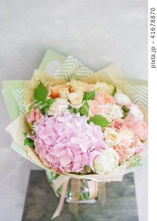 beautiful spring bouquet. flower arrangement with hydrangea and peonies. Color light pink. The 41678870