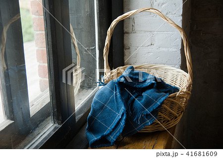 Woven basket covered with a blue cloth of soty Woven basket covered with a blue cloth of soty 41681609