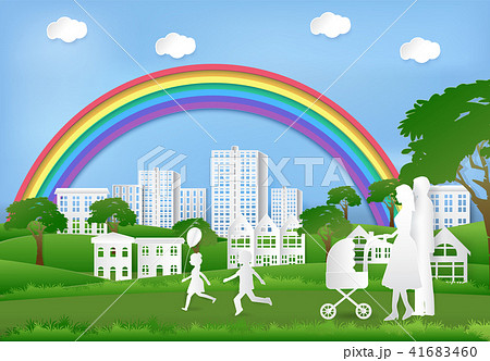 Happy family having fun in the park and rainbow  41683460