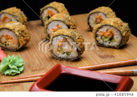 Hot fried Sushi Roll with shrimp and caviar. Hot fried Sushi Roll with shrimp and caviar. 41685948