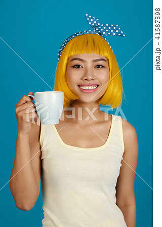 Happy coffee drinker 41687398