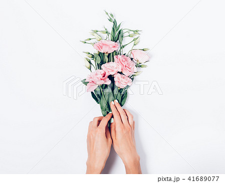 Florist making a bouquet of beautiful blooming Florist making a bouquet of beautiful blooming 41689077