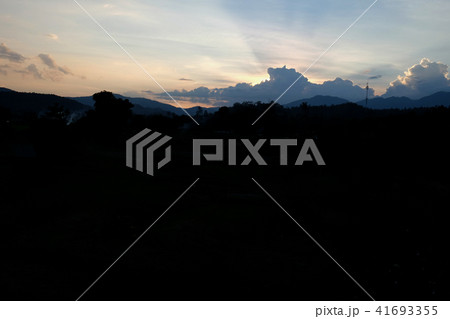 Sunset sky background with clouds and sun Sunset sky background with clouds and sun 41693355
