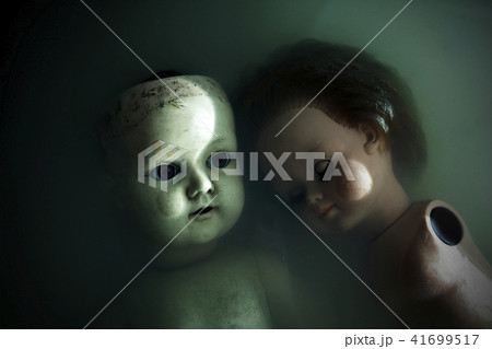 Creepy dolls in dark dirty water Creepy dolls in dark dirty water 41699517