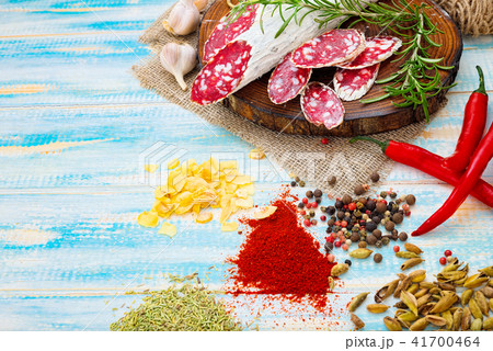 Sliced cured sausage, meat  with spices. Sliced cured sausage, meat  with spices. 41700464