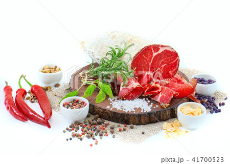 Sliced cured sausage, meat  with spices. 41700523