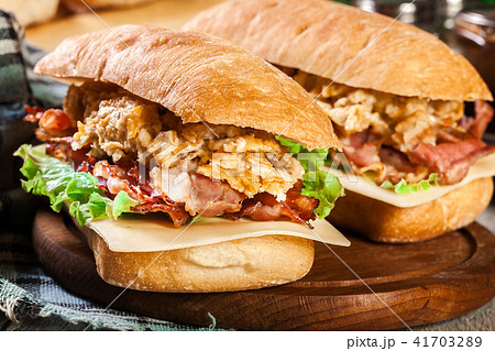 Ciabatta sandwich with smoked bacon and eggs 41703289
