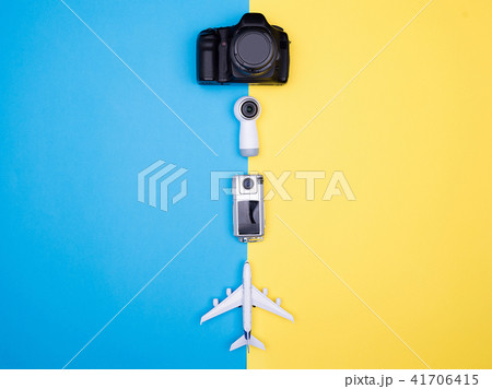 Flat lay top view of a plane on yellow backgrond 41706415