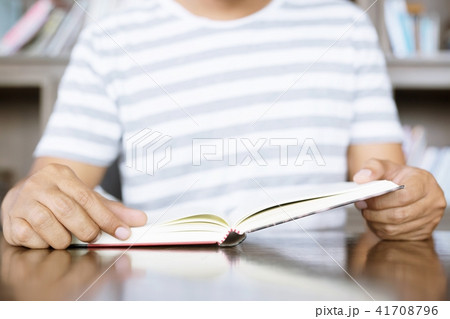 close up young man sitting in vintage chair close up young man sitting in vintage chair 41708796
