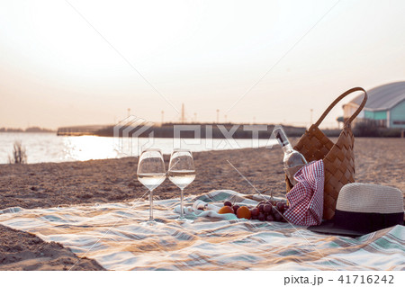 A party on the beach at sunset with wine. Romantic evening in the summer by the sea. Picnic. copy A party on the beach at sunset with wine. Romantic evening in the summer by the sea. Picnic. copy 41716242