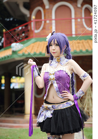 Portrait of asian young woman with purple Chinese dress cosplay with temple 41724097