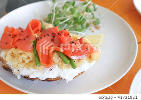 salmon sandwich or baguette with salmon topping salmon sandwich or baguette with salmon topping 41731921