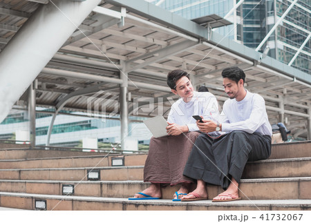 Handsome two asian person sitting on stairs 41732067