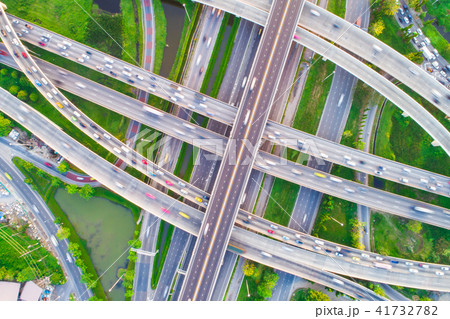 Aerial view car movement on traffic junction road Aerial view car movement on traffic junction road 41732782