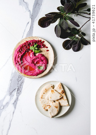 Beetroot hummus spread with nuts 41739621