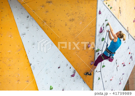 girl climbing up the wall girl climbing up the wall 41739989