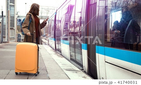 girl tourist  waits for the train 41740031