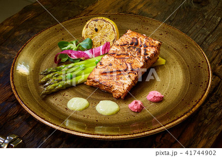 Slow Cooked Salmon fillet steak with salad on plate, Sous-Vide Cooking Salmon Fish 41744902