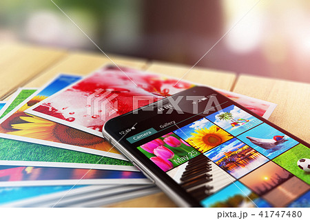 Stack of photos smartphone with image gallery app 41747480