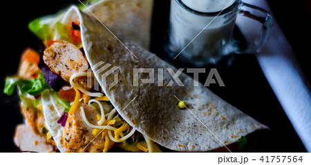 Tasty fresh wrap sandwich with meat Tasty fresh wrap sandwich with meat 41757564