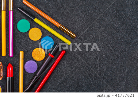 decorative cosmetics laying in a form of triangle decorative cosmetics laying in a form of triangle 41757621