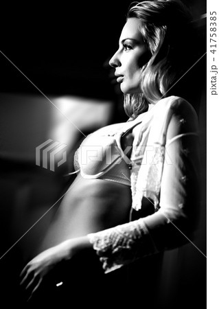 The young beautiful blond woman portrait, studio shot. 41758385
