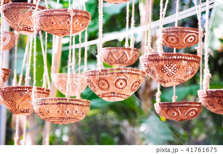 Decorative lamps or plant pot from a coconut shell Decorative lamps or plant pot from a coconut shell 41761675