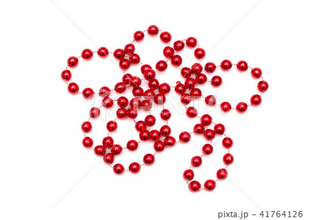 Festive red beads isolated on white background 41764126
