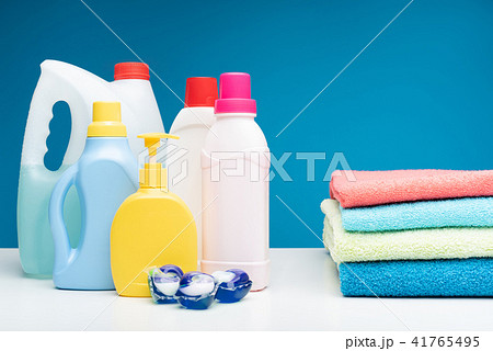 Colourful laundry items lying on table Colourful laundry items lying on table 41765495