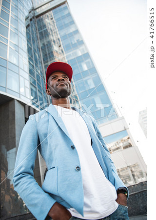 Glad male tourist going at street 41766515